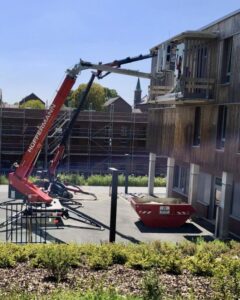 Glasmontage Hüffermann Anhängerkran E-Minikran Glasbau Verglasung